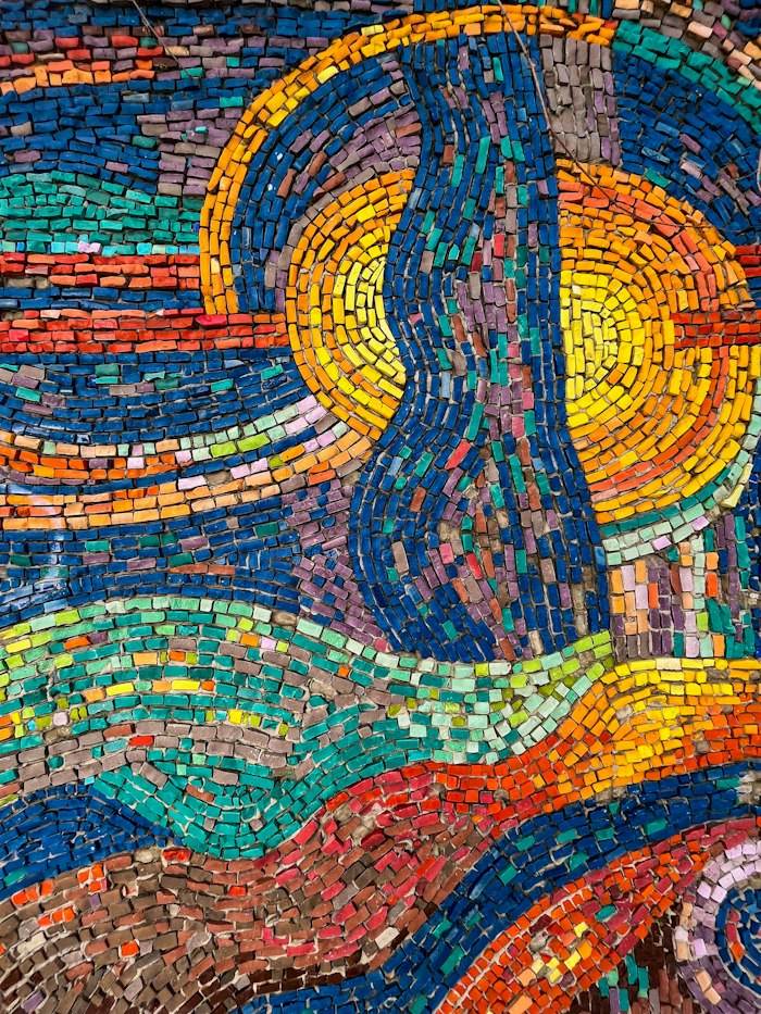 Close-up detail of a finished glass mosaic piece